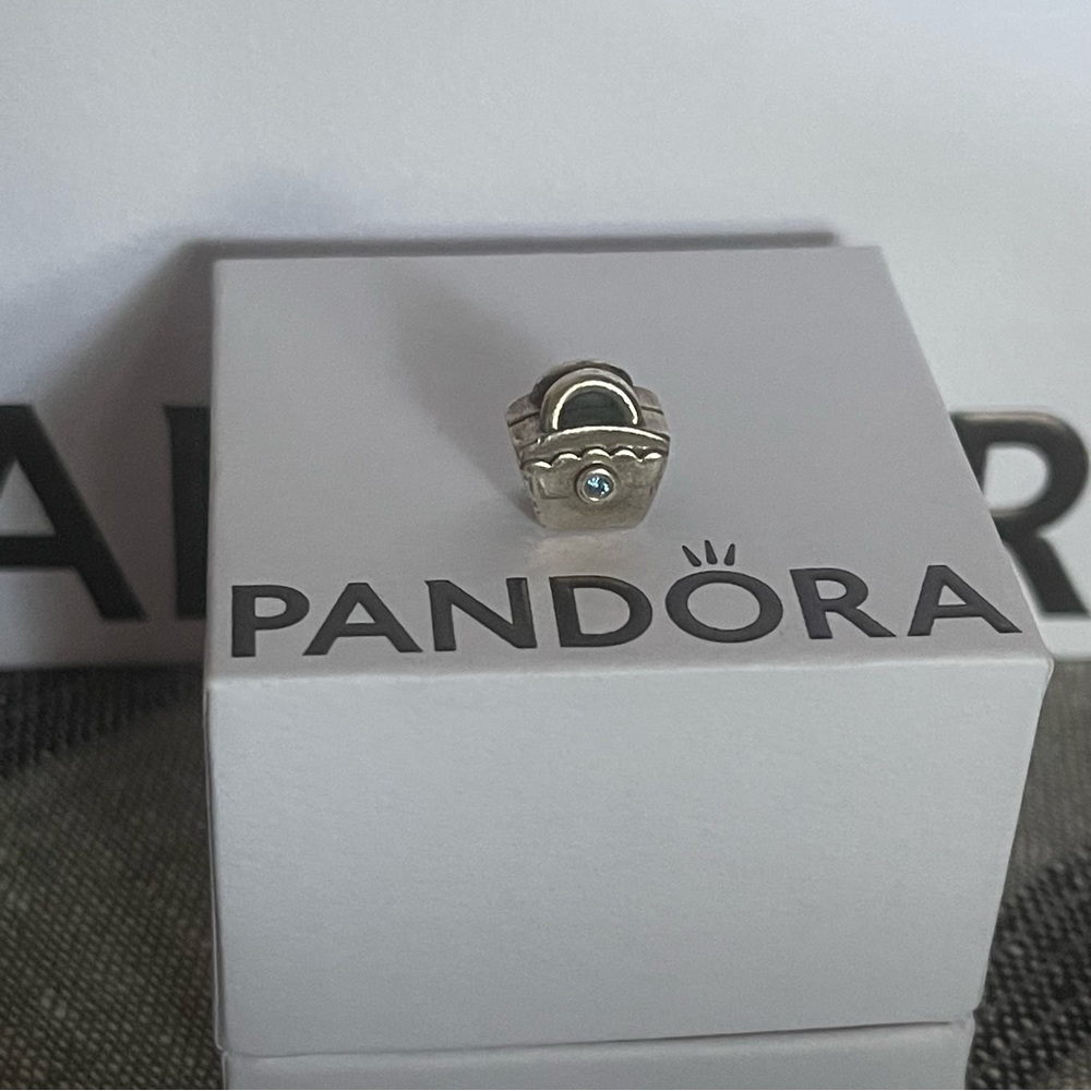 Pandora Scalloped Purse with Blue CZ Charm